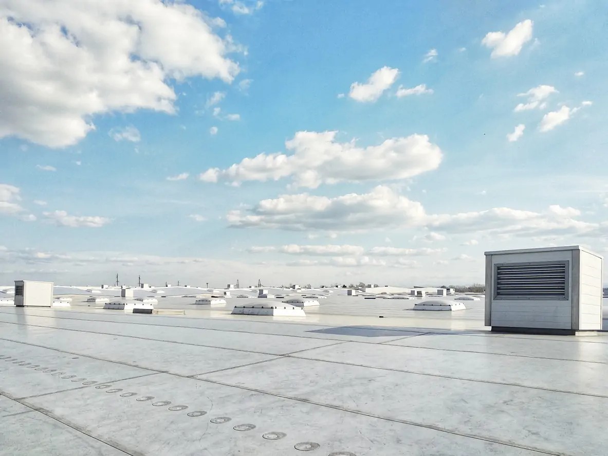 Common causes of commercial roof damage